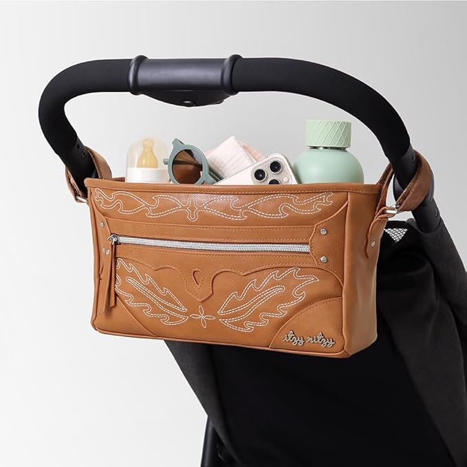 Itzy Ritzy Adjustable Stroller Caddy and Organizer Bag Featuring Front Zippered Pocket, 2 Built-In Interior Pockets & Adjustable Straps to Fit Nearly Any Stroller (Saddle)