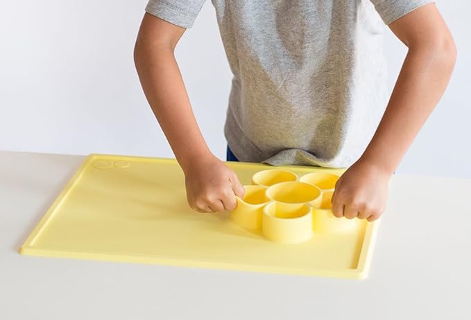 ezpz Play Mat for Baby + Toddler - 6 Months+ (Blush) - Suction Plate with Flower Compartments for Crafts, Painting, Sorting, Snack Time - Fits Standard Piece of Paper