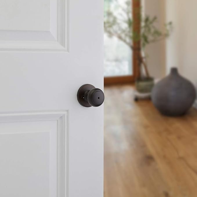 Kwikset Cove Interior Privacy Door Knob with Lock, Door Handle For Bathroom and Bedroom, Venetian Bronze Keyless Turn Lock Doorknob