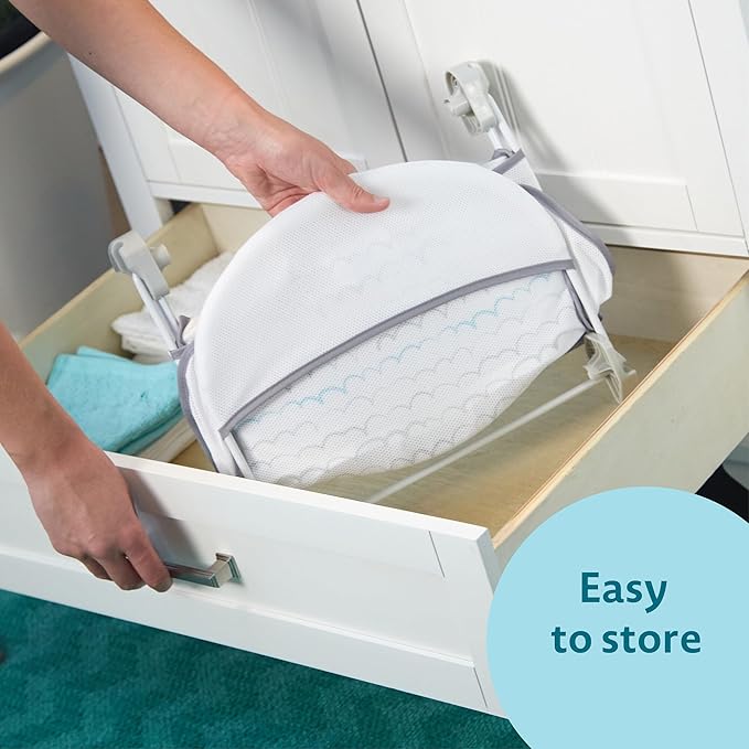 The First Years Sure Comfort Folding Baby Bather - Foldable Baby Bath Seat and Lounger for Home or On the Go - for Sink or Tub Use - Non-Slip Seat - For Up to 15 Lbs