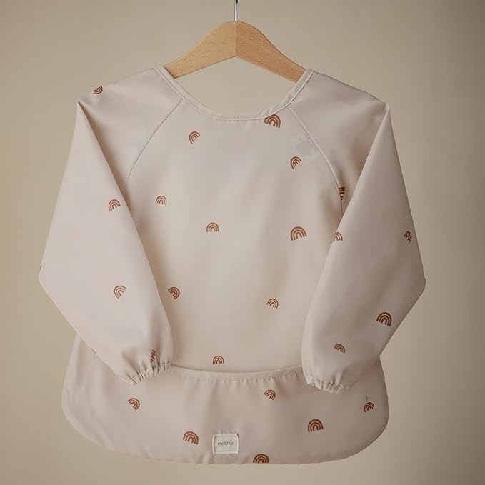 mushie Long Sleeve Baby Bib | Water Resistant Adjustable Fit for Ages 6-24 Months