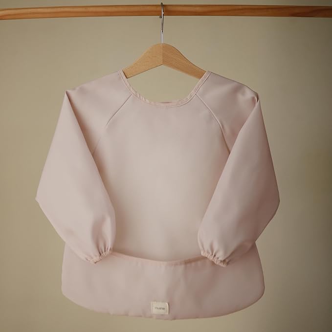 mushie Long Sleeve Baby Bib | Water Resistant Adjustable Fit for Ages 6-24 Months
