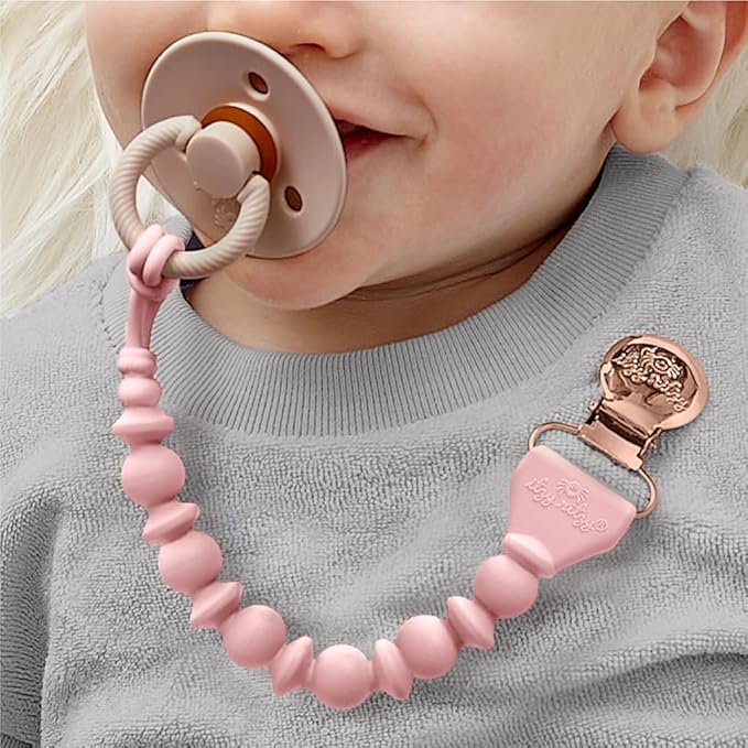 Itzy Ritzy Silicone Pacifier Clip – 100% Food Grade Silicone Pacifier Strap with Clip Keeps Pacifiers, Teethers & Small Toys in Place Features One-Piece Design & Cord (Pink)