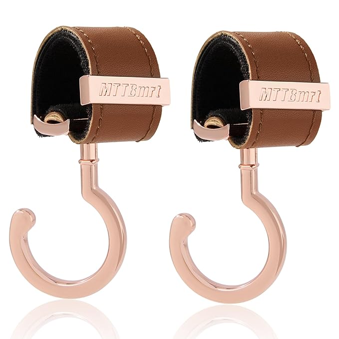 2 Pack Stroller Hooks,Strong Synthetic Leather Hook-and-Loop Fastener&High-Quality Metal Hooks,Universal Bag Clip|360° Rotation, 66lb Capacity,Non-Slip-Fits Wheelchair(Brown-Pink Gold)