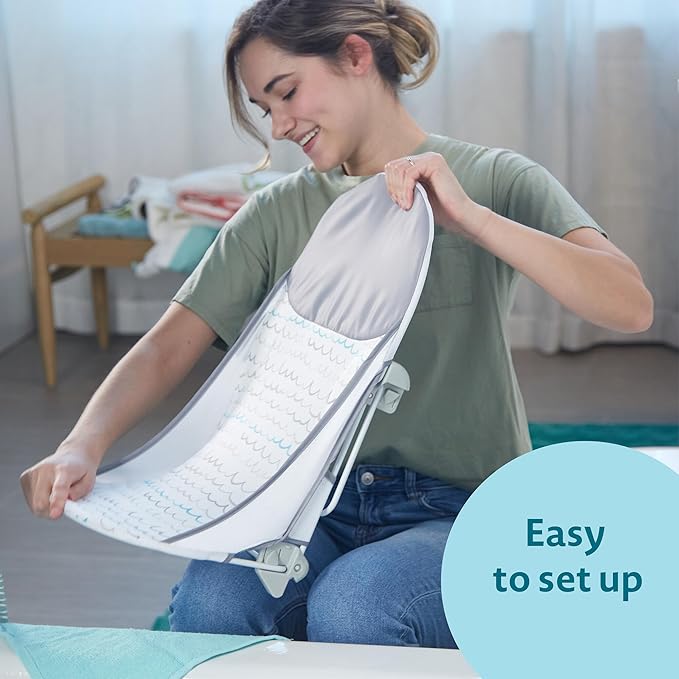 The First Years Sure Comfort Folding Baby Bather - Foldable Baby Bath Seat and Lounger for Home or On the Go - for Sink or Tub Use - Non-Slip Seat - For Up to 15 Lbs