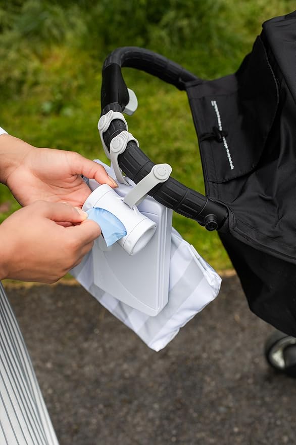 Ubbi Retractable On the Go Bag Dispenser for Baby Travel, Diaper Accessory Must Have for Newborn, Helpful Item, Baby Gift, Lavender Scented, White