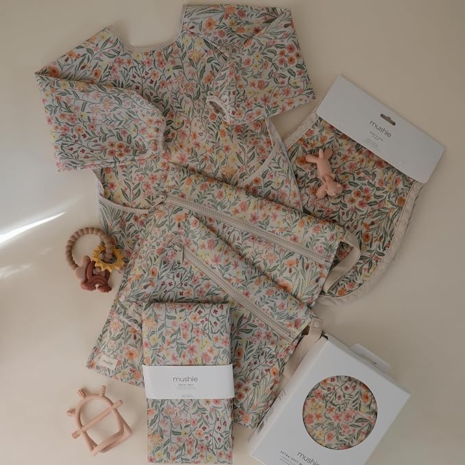 mushie Baby Splat Mat 42.5x42.5 Inch (Pastel Blooms) | Water Resistant for Under High Chair and Infant Play