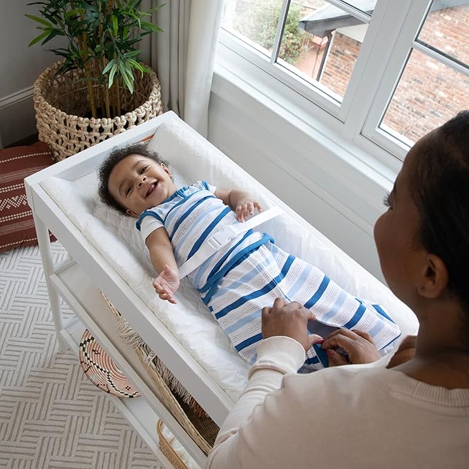 Ingenuity Contoured Changing Pad – Includes Waterproof Changing Liner and Safety Fastening Strap with Quick-Release Buckle
