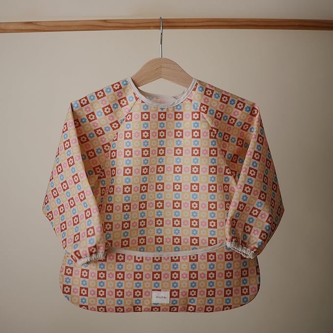 mushie Long Sleeve Baby Bib | Water Resistant Adjustable Fit for Ages 6-24 Months