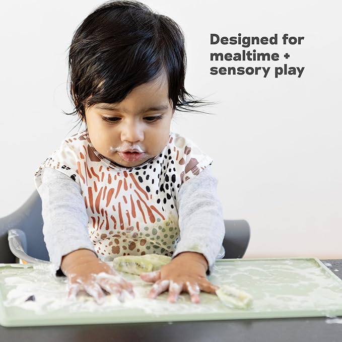 ezpz Tiny Placemat (Blush) - 6 Months+ - Non-Slip, 100% Silicone Placemat for Infants and Toddlers - Fits on Most Highchair Trays - Rolls-Up - Baby Led Weaning Supplies