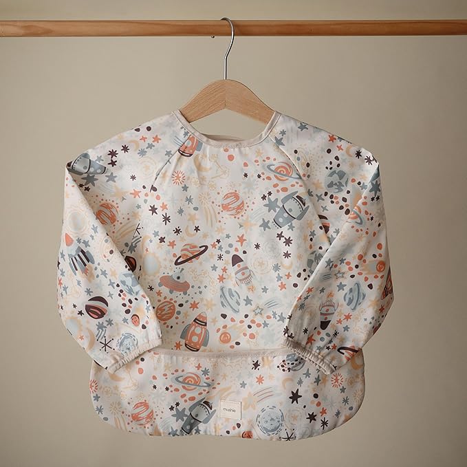 mushie Long Sleeve Baby Bib | Water Resistant Adjustable Fit for Ages 6-24 Months