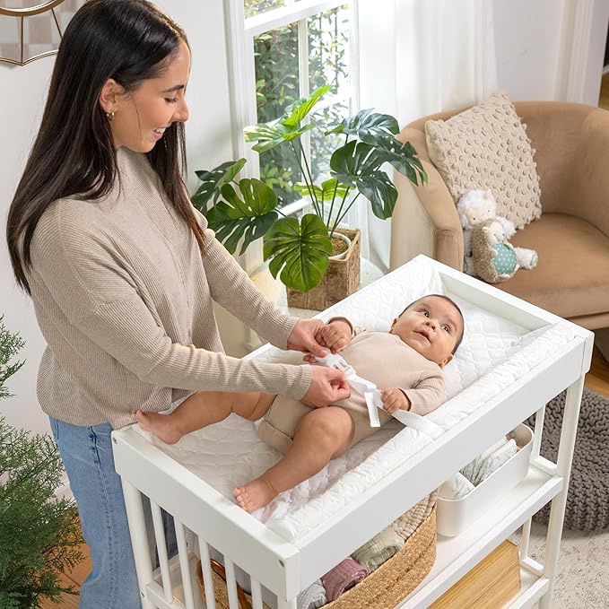 Ingenuity Contoured Changing Pad – Includes Waterproof Changing Liner and Safety Fastening Strap with Quick-Release Buckle