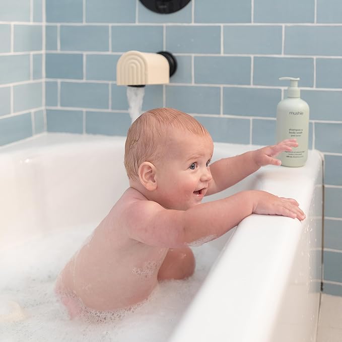 mushie Bath Spout Cover | Soft Silicone Bathtub Faucet Safety Guard for Kids | Universal Fit (Dried Thyme)